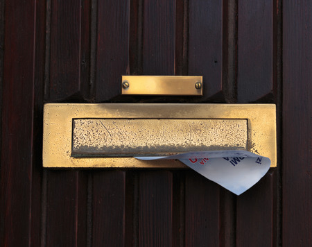 old mailbox on the wallの写真素材