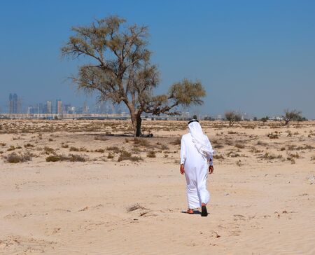 Arab man in desertの写真素材