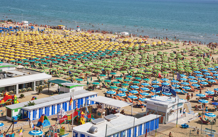 RIMINI, ITALY - 24 JUNE, 2014: Public beach town on the Mediterranean Seaのeditorial素材