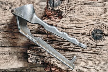 Straw chopper garlic on old wooden boardsの写真素材
