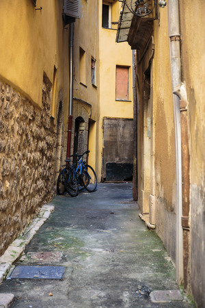 Narrow street  in the old town in Franceの写真素材