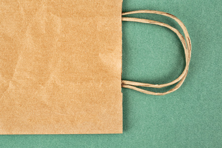 Paper bag on green backgroundの写真素材