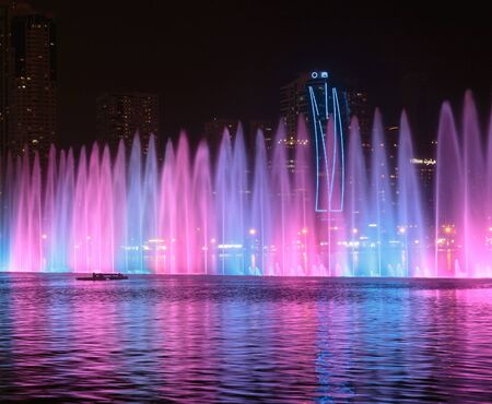 SHARJAH, UAE - OCTOBER 29, 2013: Musical fountain show. The Sharjah Fountain is one of the biggest fountains in the region.のeditorial素材