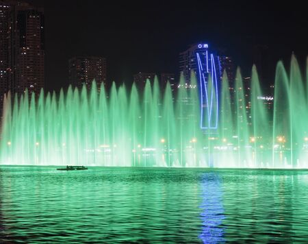 SHARJAH, UAE - OCTOBER 29, 2013: Musical fountain show. The Sharjah Fountain is one of the biggest fountains in the region.のeditorial素材