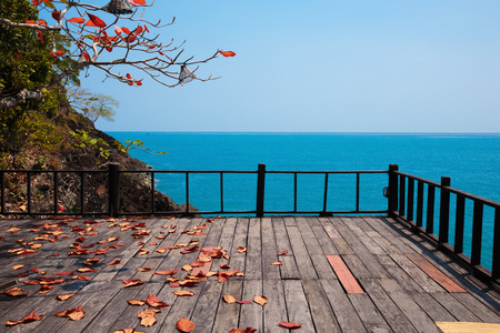 Terrace on a rock by the seaの写真素材