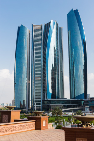 ABU DHABI, UAE - NOVEMBER 5, 2013: Modern high-rise office buildingsのeditorial素材