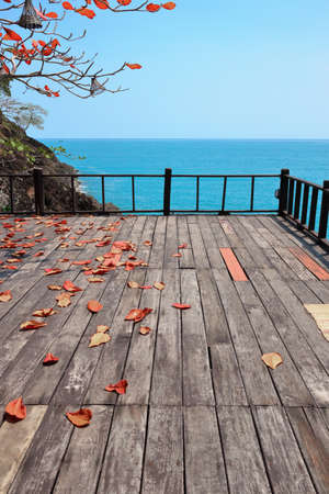 Terrace on a rock by the seaの写真素材