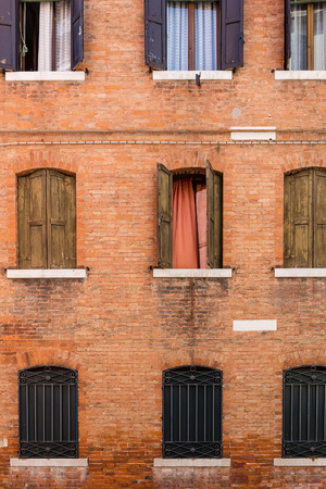 Facade of the old Italian house in Veniceの写真素材
