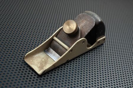 Vintage jointer on a metallic background