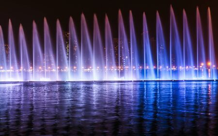 SHARJAH, UAE - OCTOBER 29, 2013: Musical fountain show. The Sharjah Fountain is one of the biggest fountains in the region.のeditorial素材