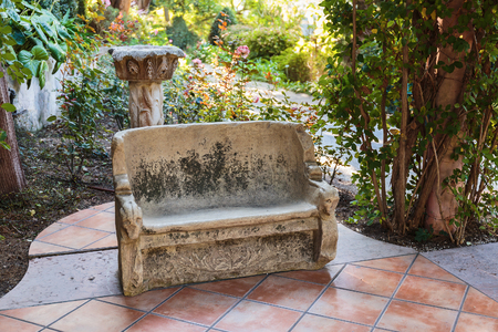 Empty stone bench in the parkの写真素材