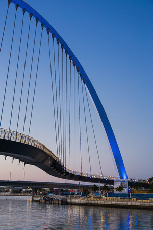 DUBAI, UAE - NOVEMBER 29, 2017: Dubai Water Canal arch bridge at nightのeditorial素材
