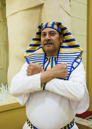 DUBAI, UAE - DECEMBER 4, 2017: Man in national costume in the pavilion of Egypt in Global Village