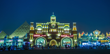 DUBAI, UAE - DECEMBER 4, 2017: General view of the central area at night  in the park entertainment center Global Villageのeditorial素材