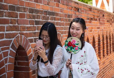 MOSCOW, RUSSIA - JUNE 16, 2018: Japanese girl tourists  in museum-reserve Tsaritsynoのeditorial素材