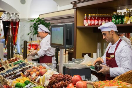 MOSCOW, RUSSIA - June 16, 2018: Fruit seller in the deli number 1, State Universal Store (GUM)のeditorial素材