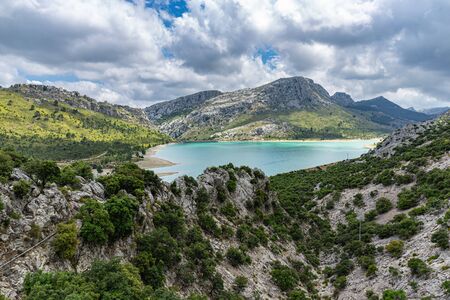 Picturesque landscape with a lake in the mountains of Tramontana on the island of Mallorcaの写真素材