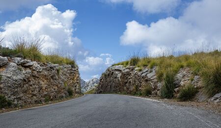 Road in the mountains  of Sierra de Tramuntana on the island of Mallorcaの写真素材