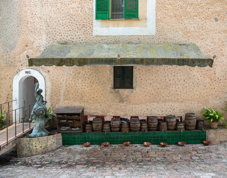 Mallorca, Spain - 28.05.2019: Barrels of wine for tasting in an old Spanish manor Granja