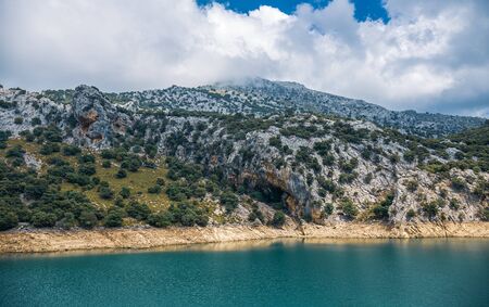 Picturesque landscape with a lake Cuber in the mountains of Tramontana on the island of Mallorcaの写真素材
