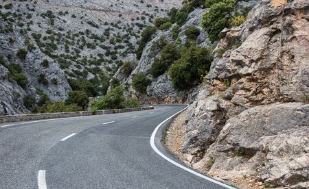 Winding highway in the mountains  of Mallorcaの写真素材