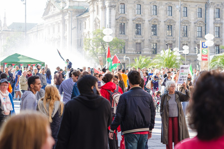MUNICH, GERMANY - AUGUST 16, 2014: Inscription on the poster: Freedom for Palestine - Peace for...