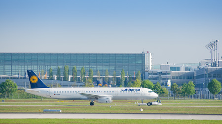 Munich, Germany - May 6, 2016: Jet airliner Airbus A321-231 of Deutsche Lufthansa AG airlines after landing taxiing on pushback tug at Munich international passenger airportのeditorial素材
