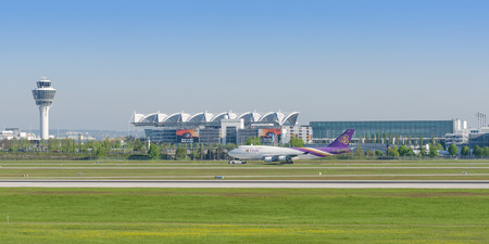 Munich, Germany - May 6, 2016: Passenger turbojet airliner Boeing 747-400 of Thai Airways International airlines taxiing on pushback tug in Munich international airportのeditorial素材