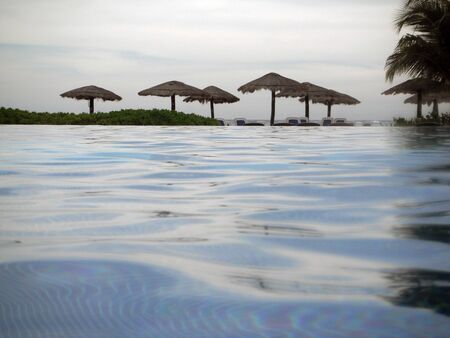 Pool with sea backgroundの写真素材