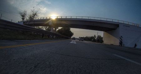 Freeway seen from a moving carの写真素材