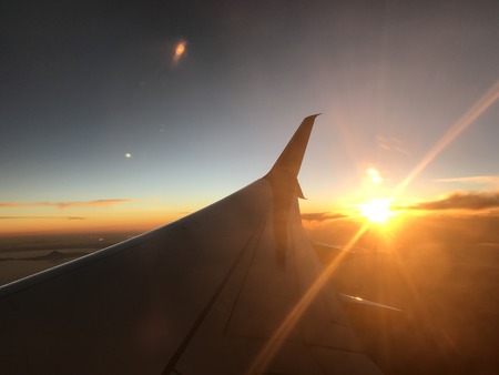 Sunset on a flightの写真素材