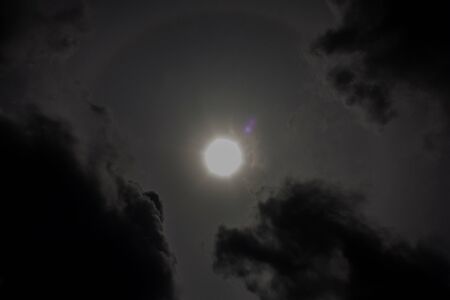 Sun with cloudy skyの写真素材