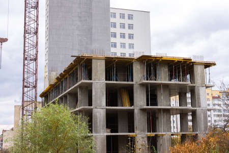 Construction of a multi-storey building in the city, concrete walls with reinforcement