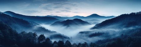 Mystical mysterious fog over the forest tops overlooking the mountains at sunset, bannerの素材
