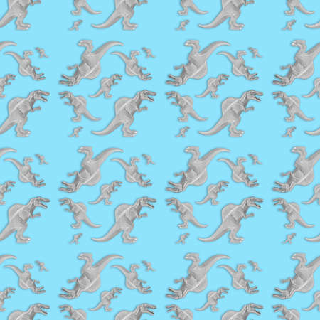 Creative seamless dinosaur pattern on blue background. Abstract art. The concept of minimalism.の写真素材