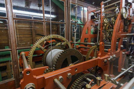 detail of a steel rope rolled on a old mechanical gear