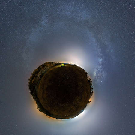 little planet panorama of croatian landscape with tent and milky way at nightの写真素材