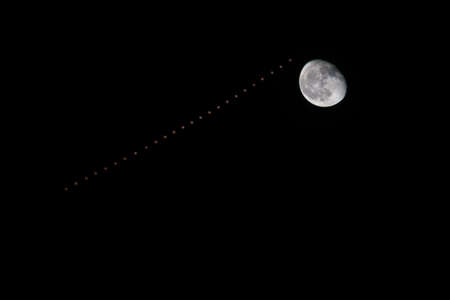Timelapse of conjunction of Mars moving on Night sky to the full Moonの写真素材