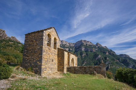 Old abandoned chapel of Sercue Iglesia de San Miguel in Pyrenees mountains near Anisclo Canyon, Ordesa y Monte Perdido National Park, Huesca, Spainの写真素材