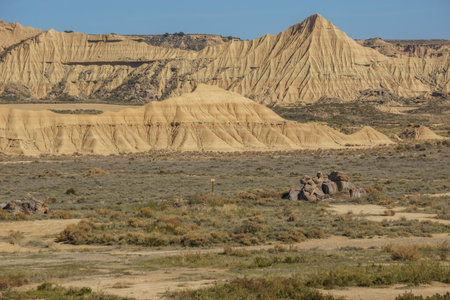 Rock formations at desert landscape of the arid plateau of the Bardenas Reales, Arguedas, Navarra, Spainの写真素材