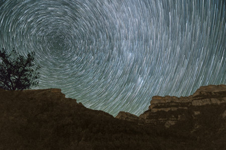 Startrails at Night over Canon de Anisclo in Pyrenees Mountains, Ordesa y Monte Perdido National...