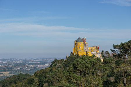 Palace of Pena on top of a hill between forest in Sintra. Lisbon, Portugal