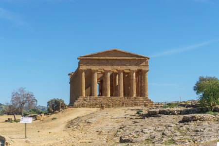 The Temple of Concordia an ancient Greek temple in the Valley of the Temples on a sunny spring day, Agrigento, Sicily, Italyの写真素材