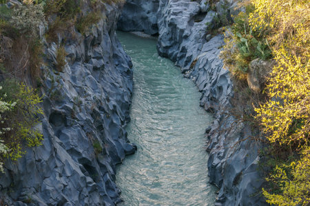 Gole dell Alcantara gorge formed by basalt columns with river near to Etna volcano, Motta Camastra, Sicily, Italyの写真素材