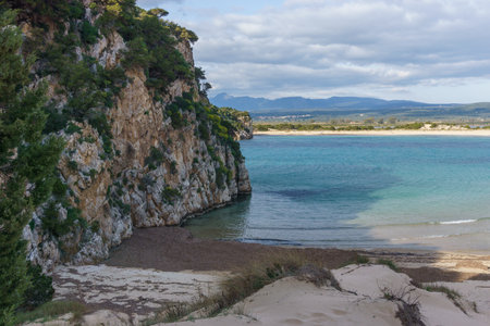 Idyllic voidokilia beach with turquoise colored water on a sunny spring day, Messinia, Peloponnese, Greeceの写真素材