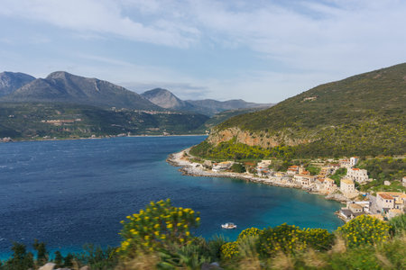 Scenic view at the picturesque coastal village with turquoise colored water in springtime, Limeni, Mani, Peloponnese, Greeceの写真素材