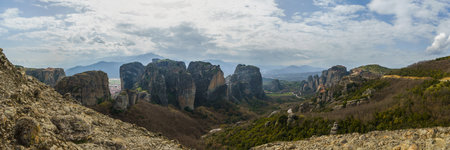 Panoramic view of famous rock formations Meteora with monasteries on top of the rocks, Kalambaka, Thessaly, Greeceの写真素材
