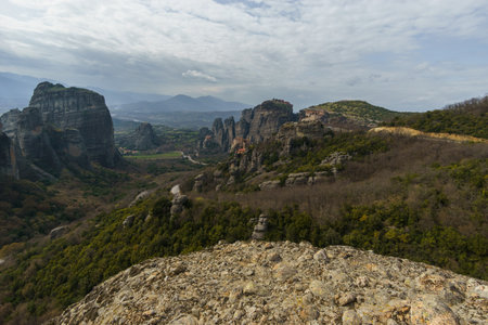Rock formations Meteora with Roussanou, Varlaam, Great Meteoron and Agios Nikolaos Monasteries building on top of rocks, Kalambaka, Thessaly, Greeceの写真素材