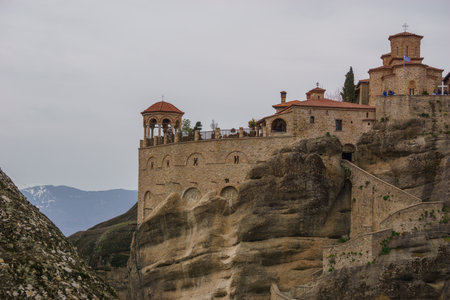 Detail view of landscape of the famous rock formations of Meteora with Varlaam Monastery on top of the rocks, Kalambaka, Thessaly, Greeceの写真素材