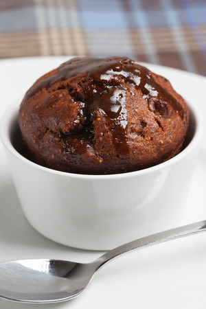 Fig pudding in a white ramekin.の写真素材